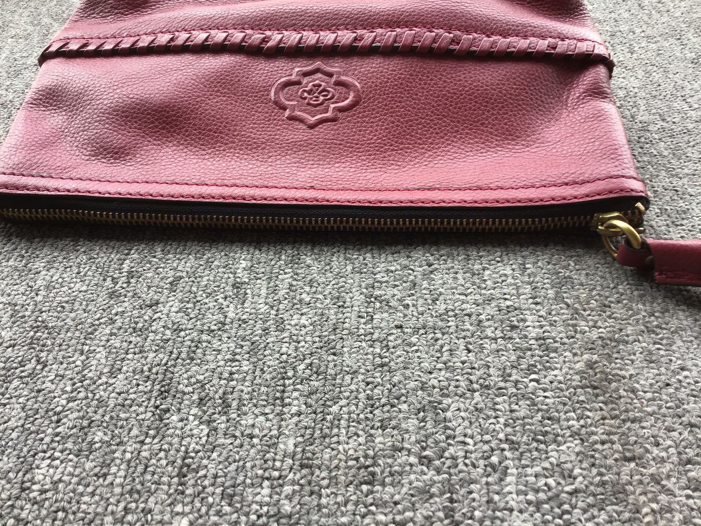 orYany Burgundy Leather Zippered Clutch w/Tassels