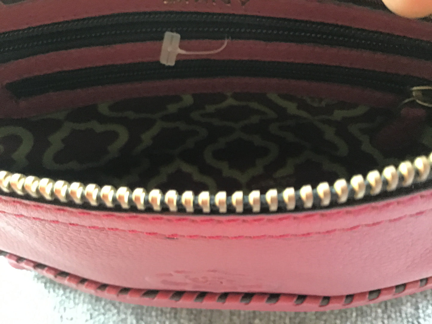 orYany Burgundy Leather Zippered Clutch w/Tassels