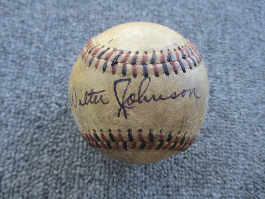 Walter Johnson Signed Baseball 1920's Red & Black Stitched Baseball PSA