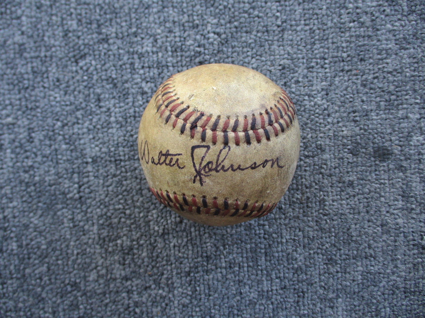 Walter Johnson Signed Baseball 1920's Red & Black Stitched Baseball PSA